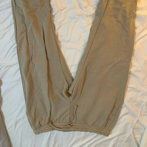 These are tan H&M Sweats, the brand Divided. They are a size XL.